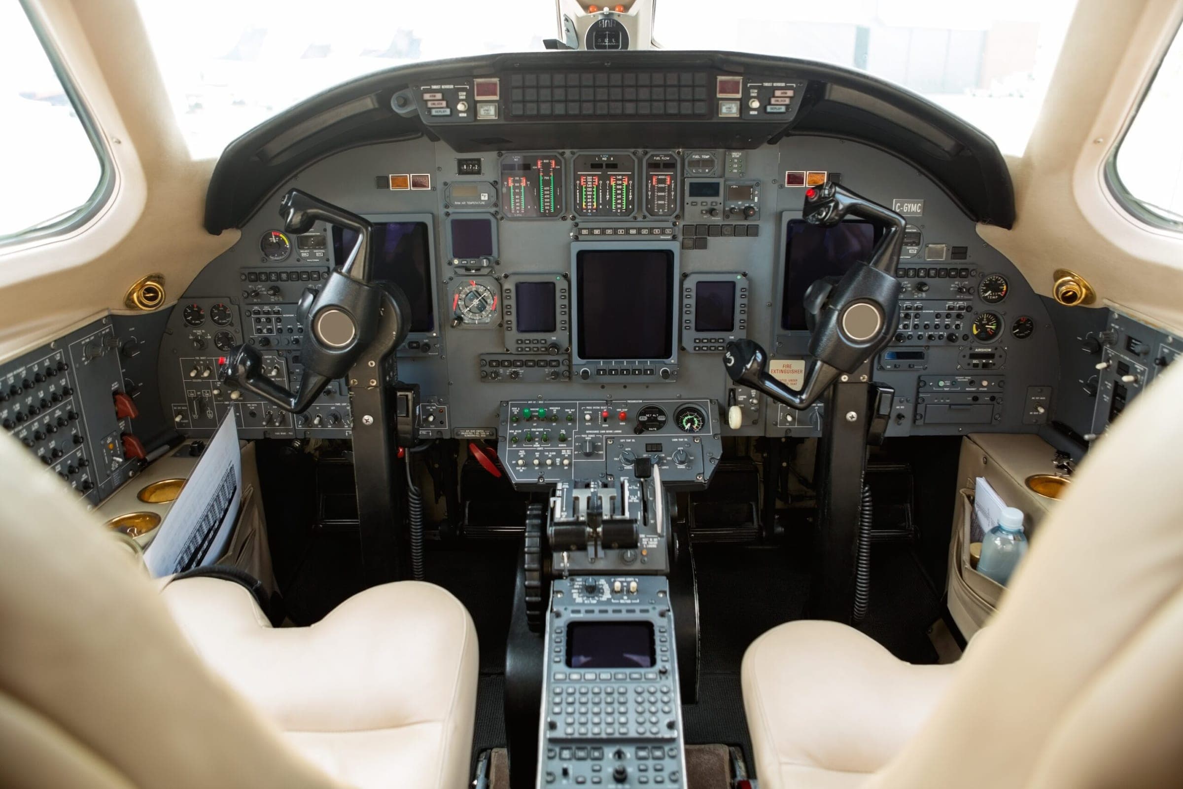 Instrument panels in cockpit of private business jet Cessna Citation - avionics powered off