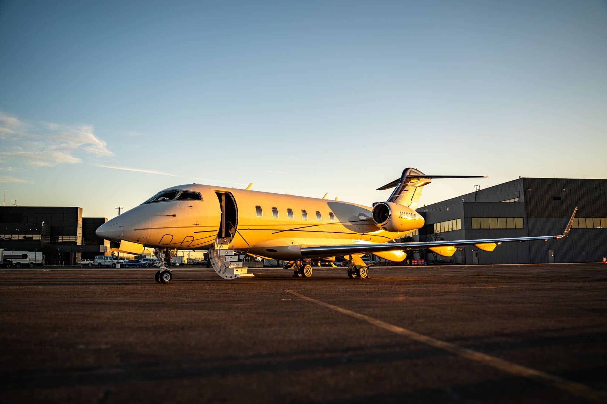 CRAFT Challenger 350 N150MB at golden hour outside the hangar