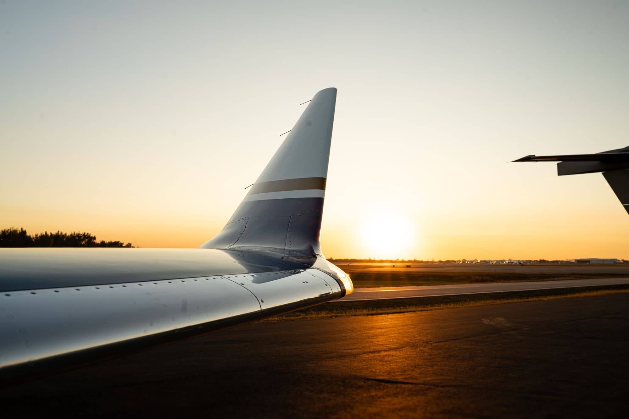 Winglet of a CRAFT Challenger 350 against the setting sun