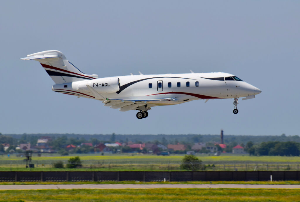 Bombardier Challenger 350 P4-AGL landing at airport