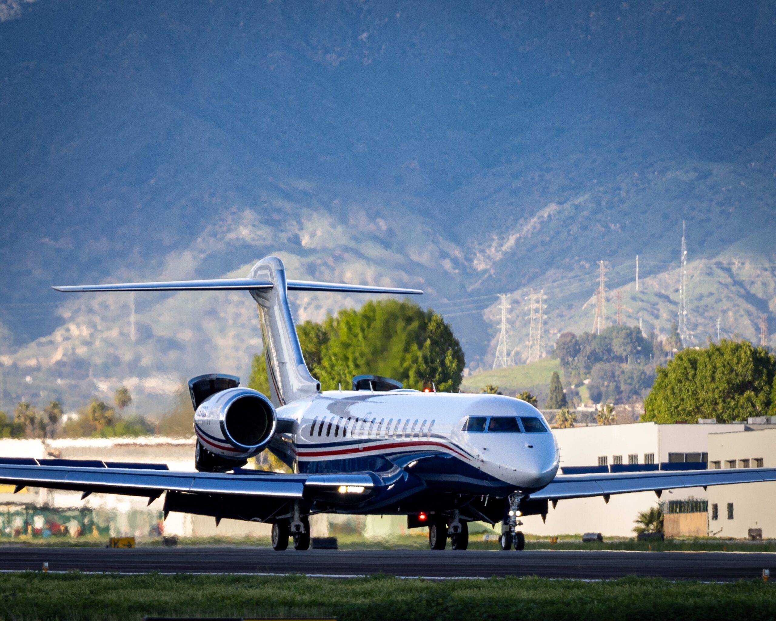 Bombardier Global 7500 landing at Van Nuys Airport, CA, USA with thrust reversers engaged