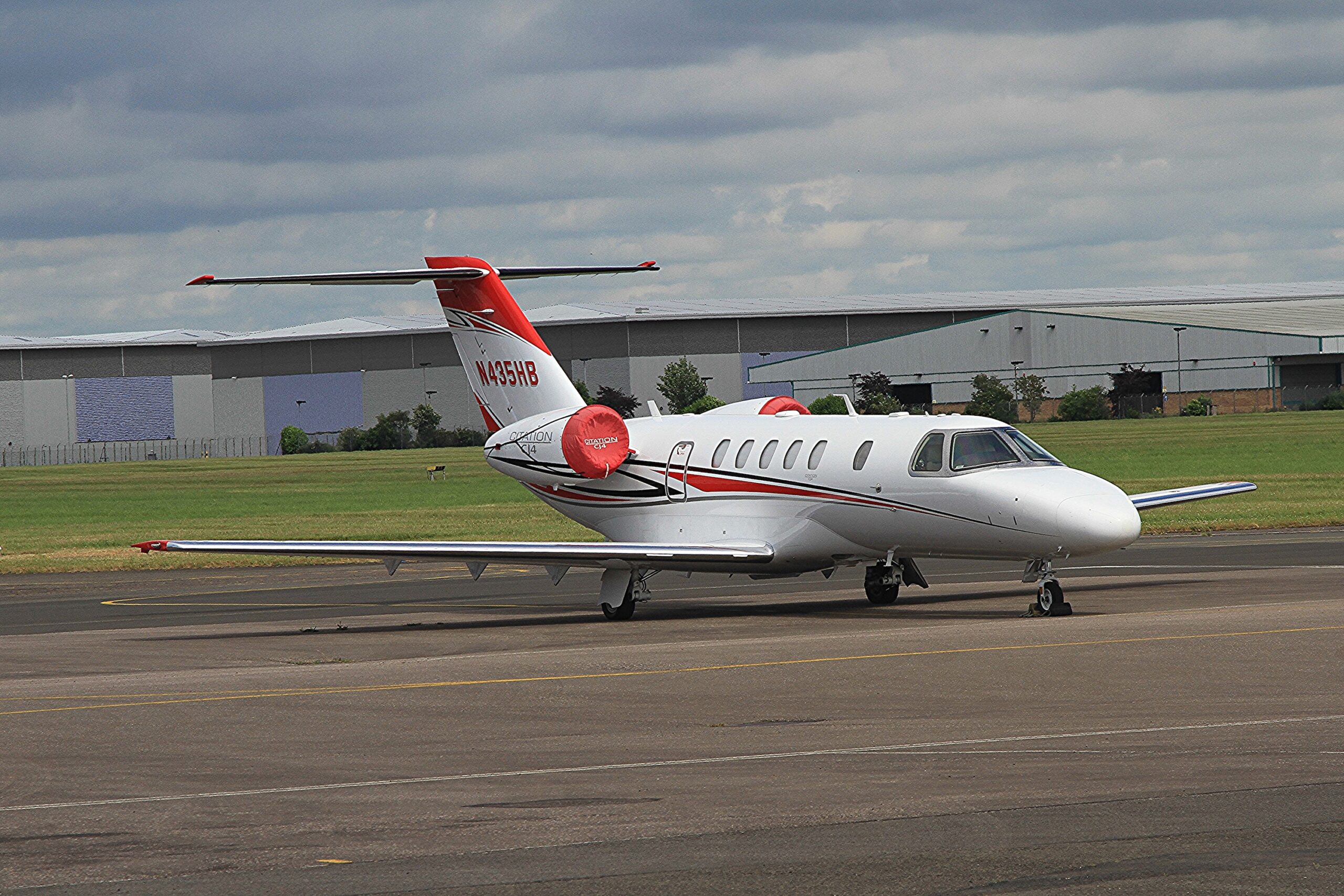 Cessna Citation CJ4 on ground reg number N435HB with engine covers on