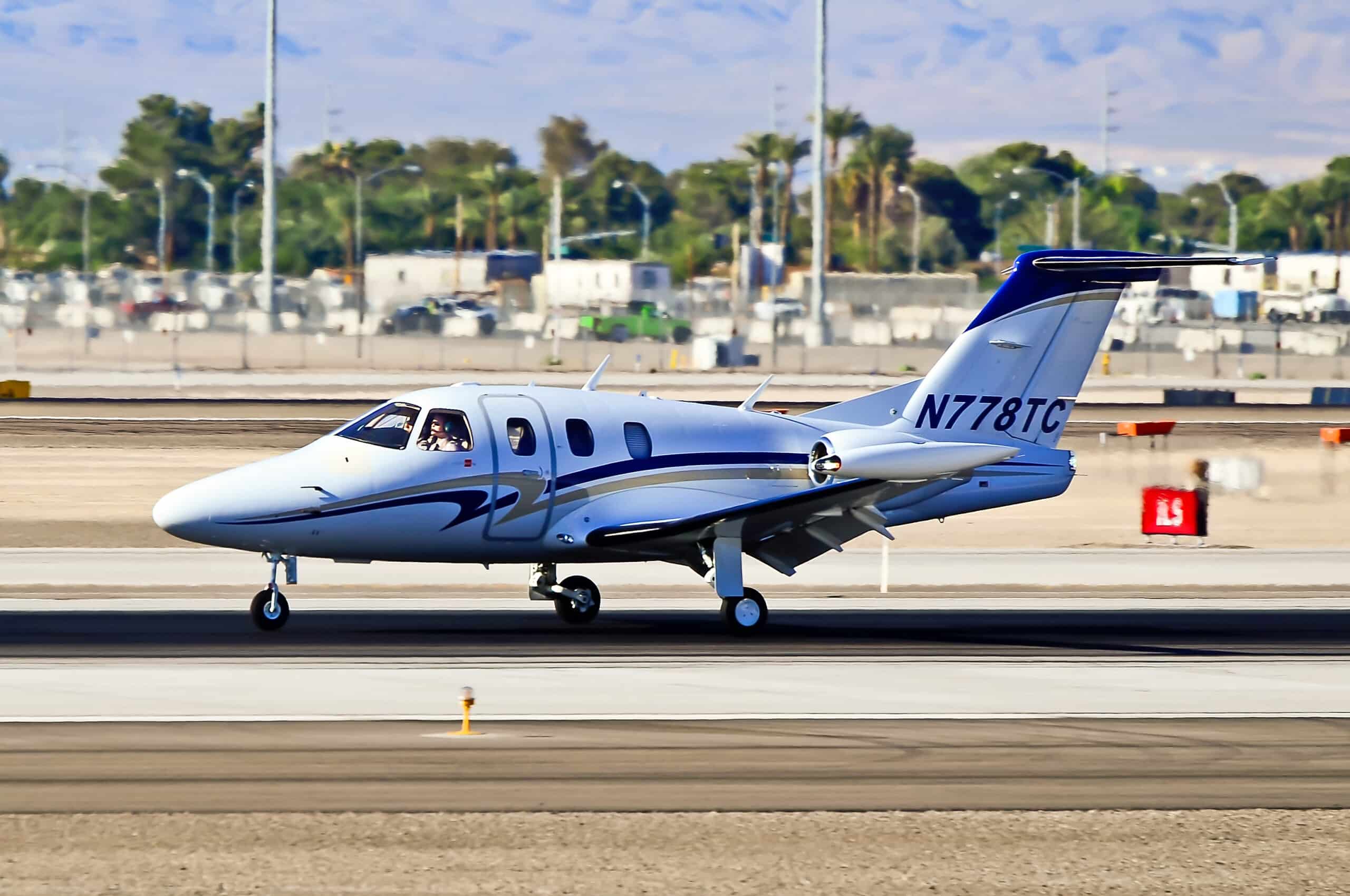 Eclipse 500 on runway at airport
