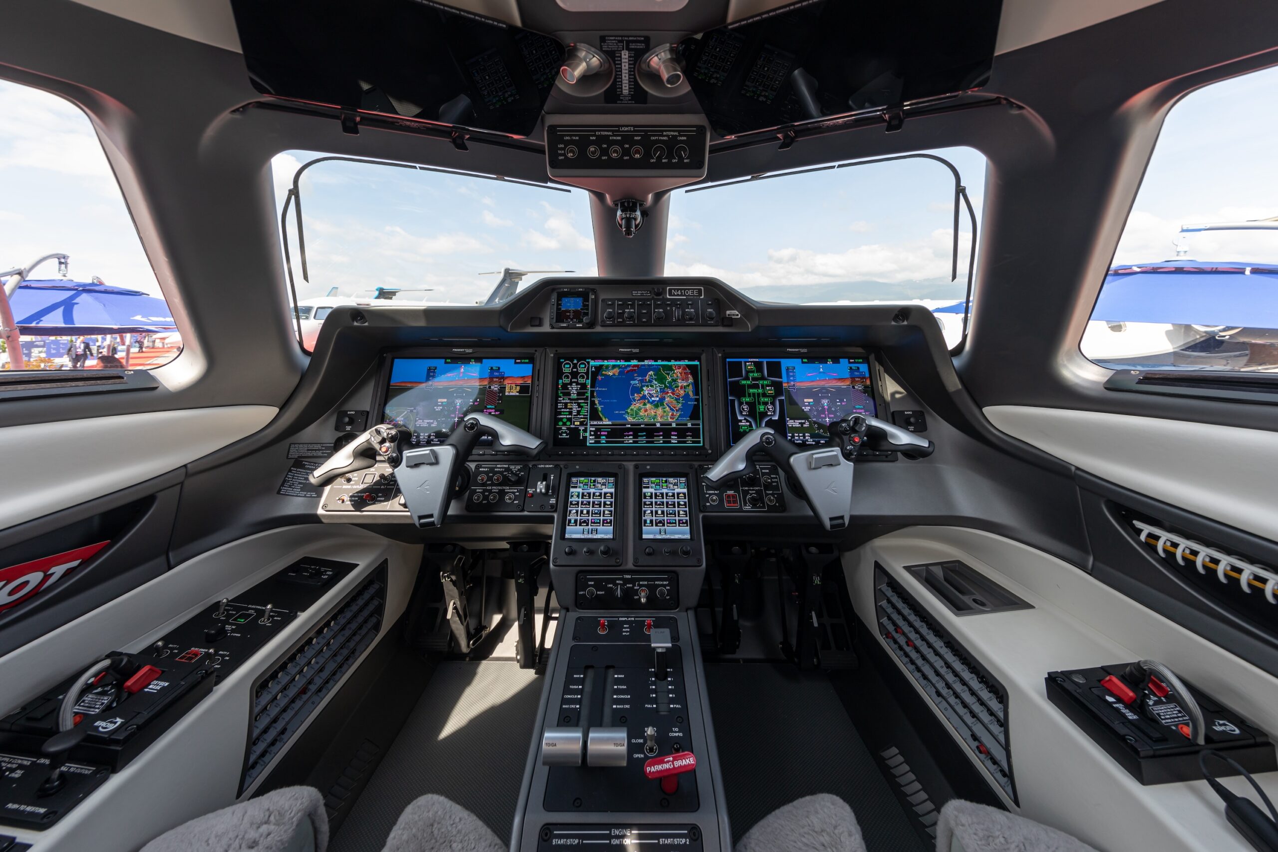 Embraer Phenom 100/100E/100EV cockpit with avionics powered on at airshow