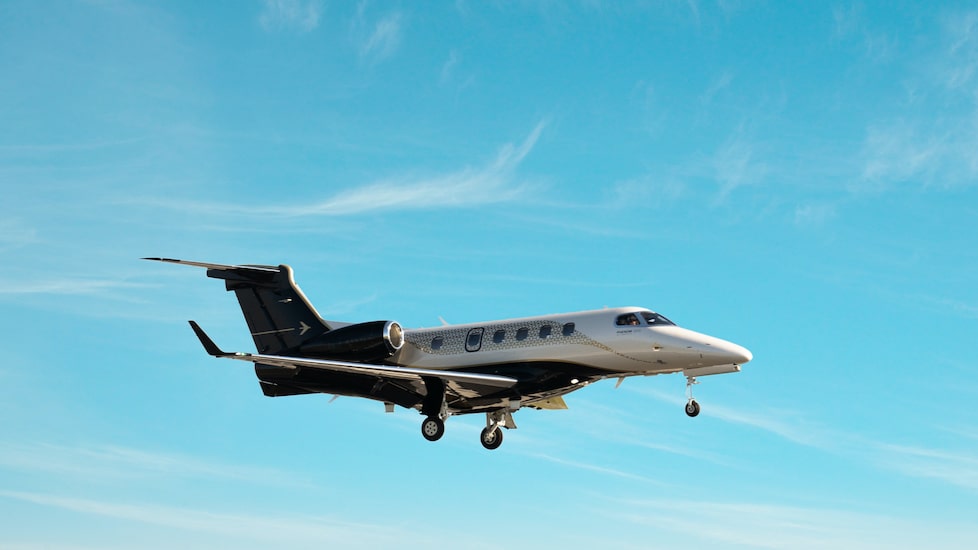 Embraer Phenom 300E exterior on approach to land