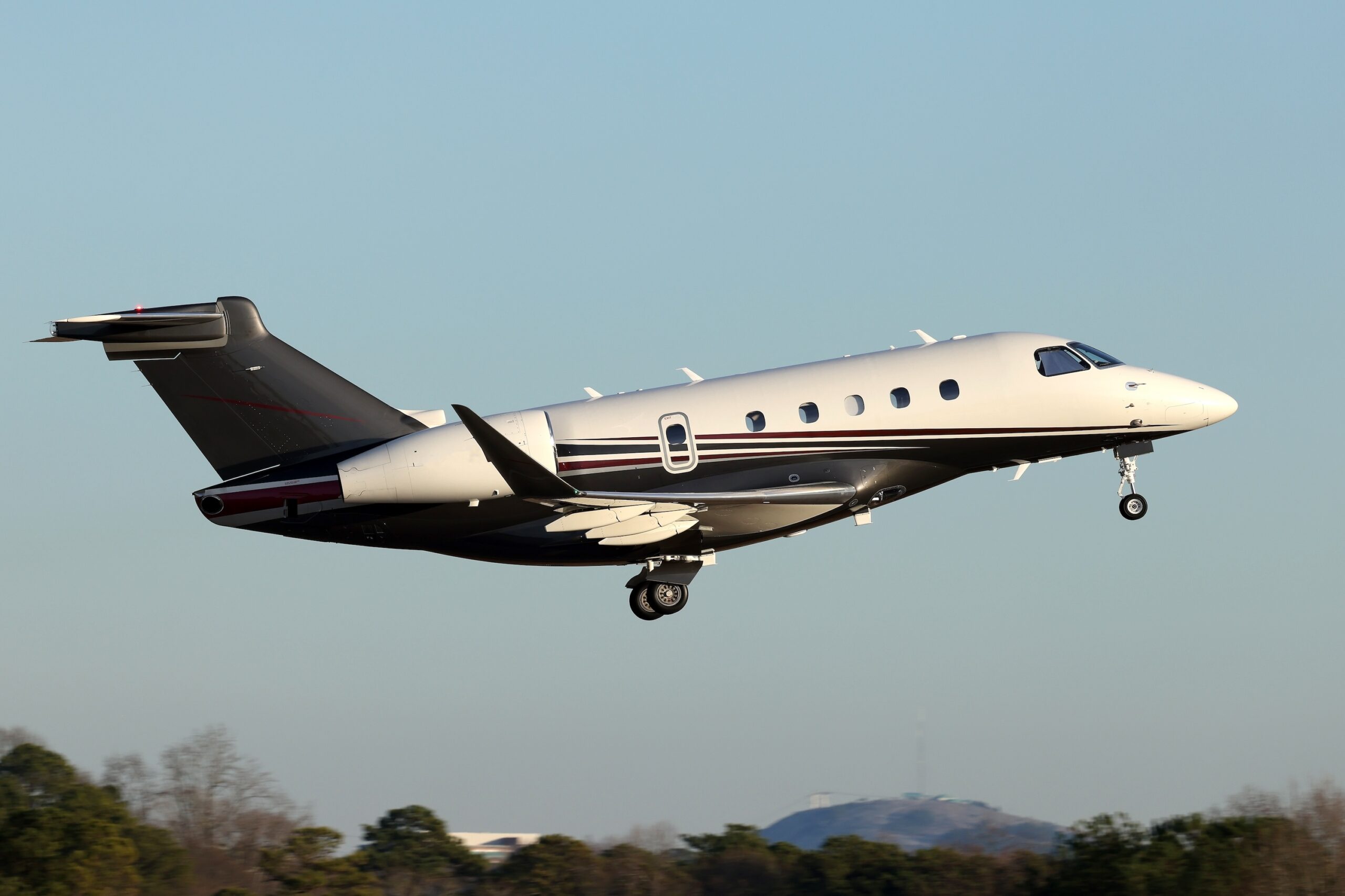 Embraer EMB-545 Praetor 500 corporate jet aircraft, taking off at the Atlanta Peachtree Dekalb Airport (PDK)