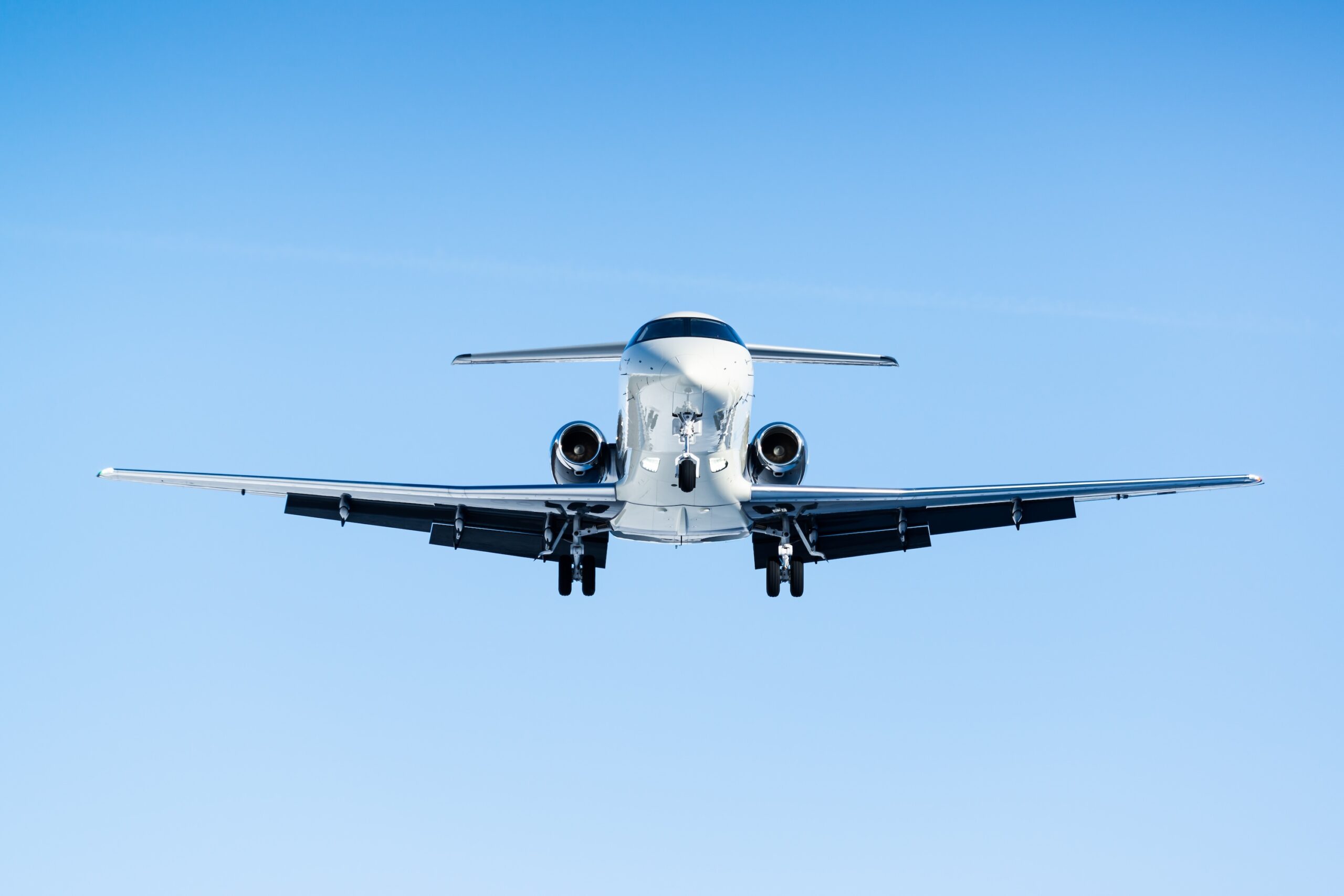 Business jet landing at the alpine airport in Samedan in the engadin valley in the Swiss alps