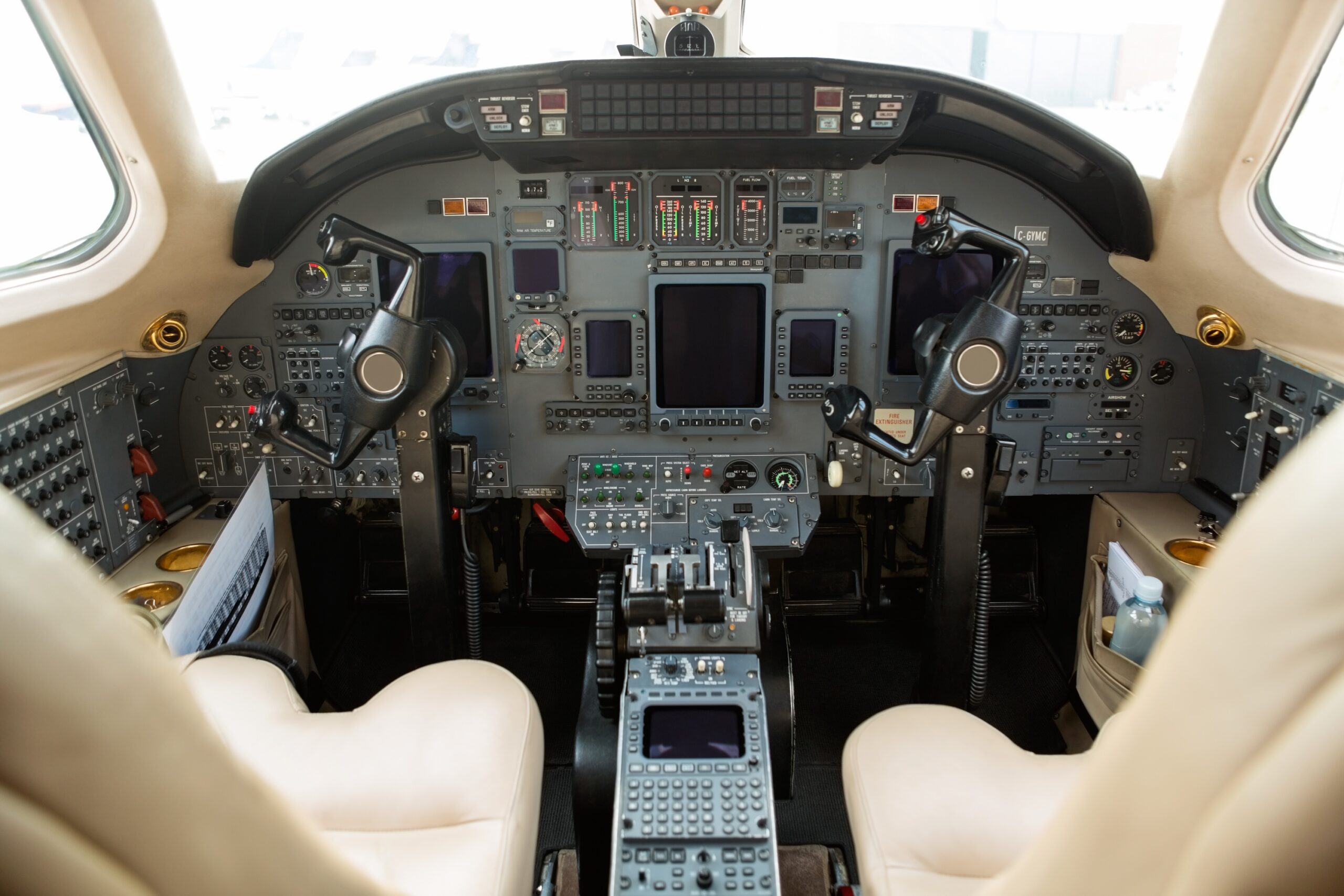 Instrument panels in cockpit of private business jet Cessna Citation - avionics powered off