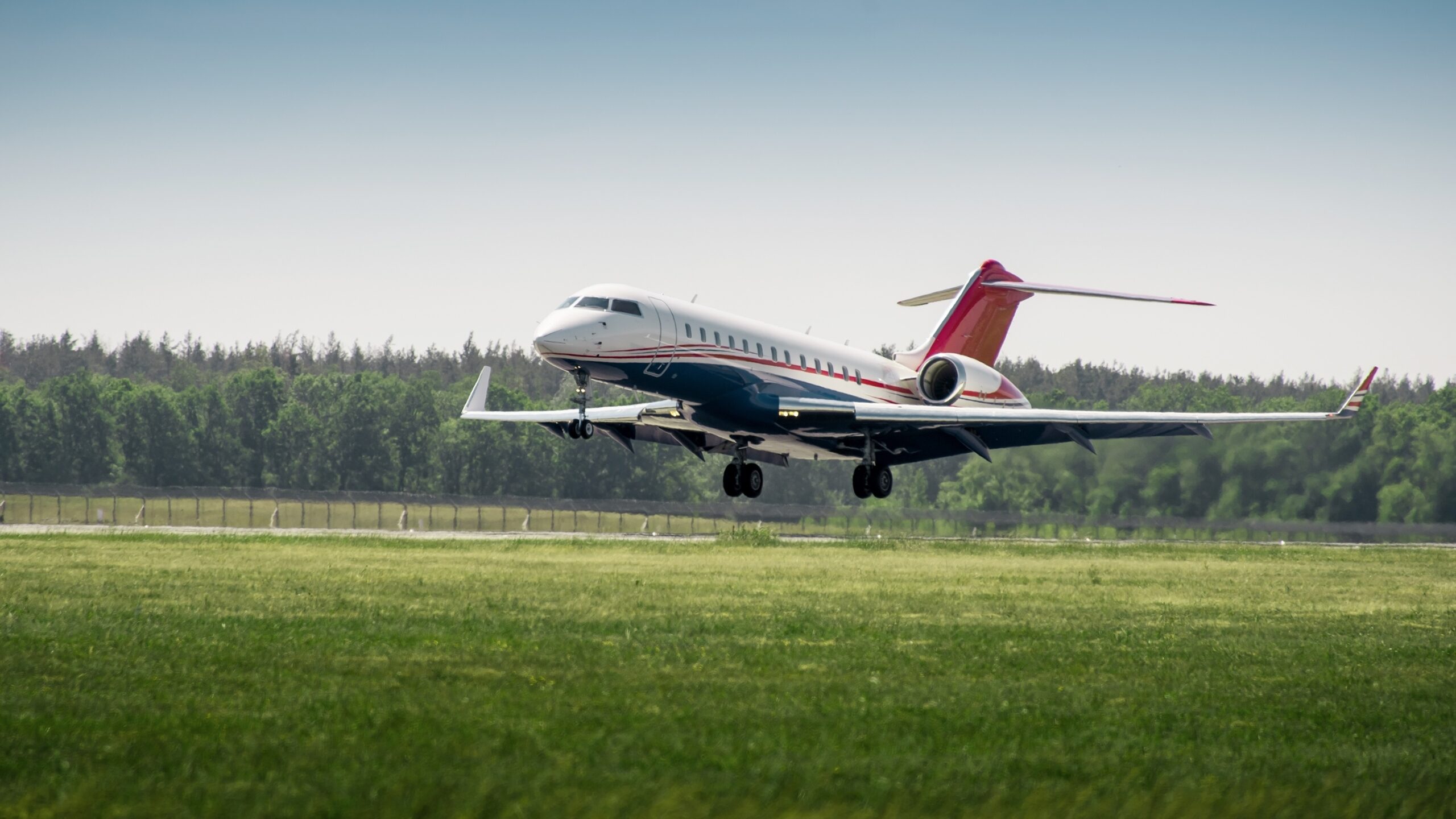 Bombardier Global aircraft moments before landing and flaring