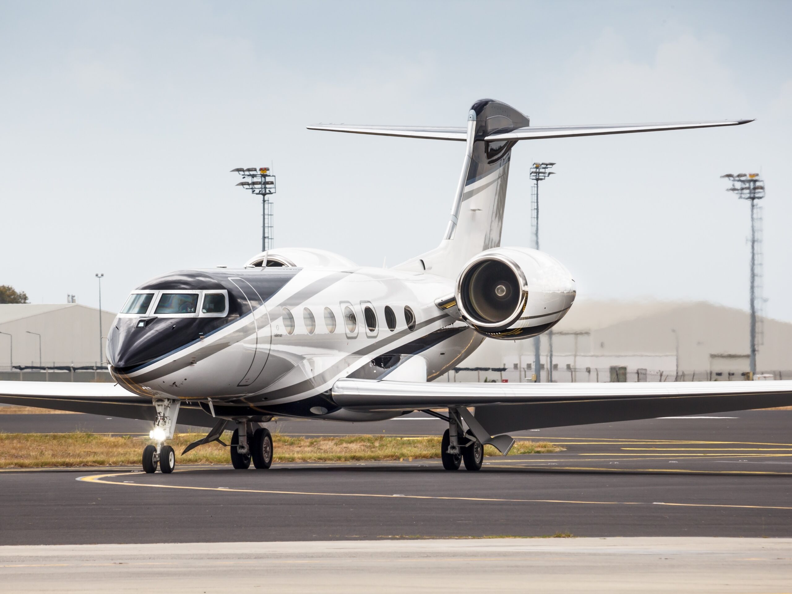 Gulfstream taxiing at airport to FBO after arriving at airport