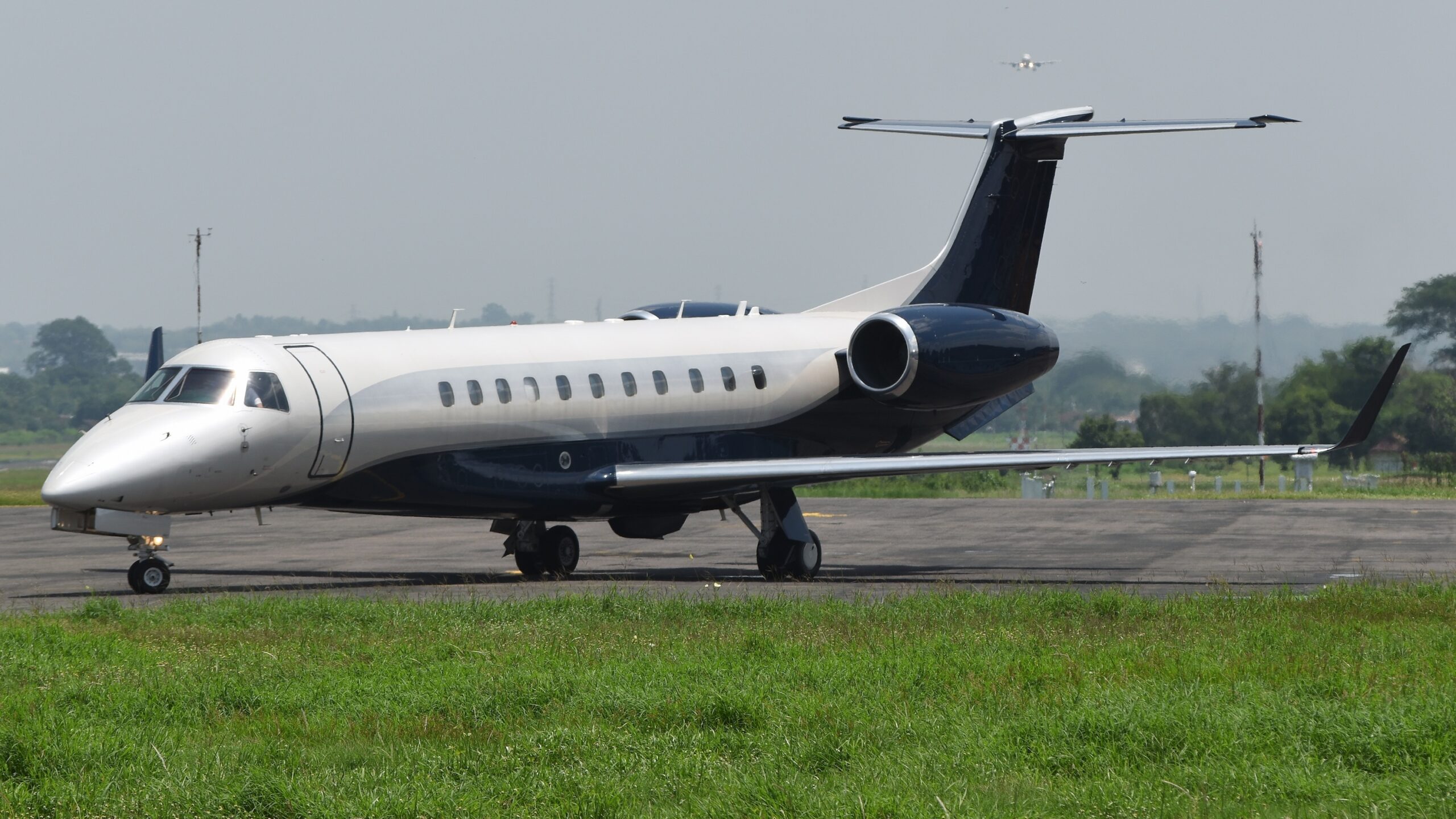 Embraer Legacy taxiing to take off