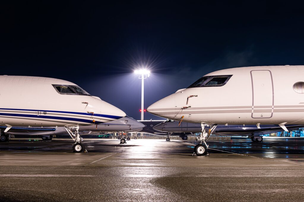 Private jet sparked at night nose to nose