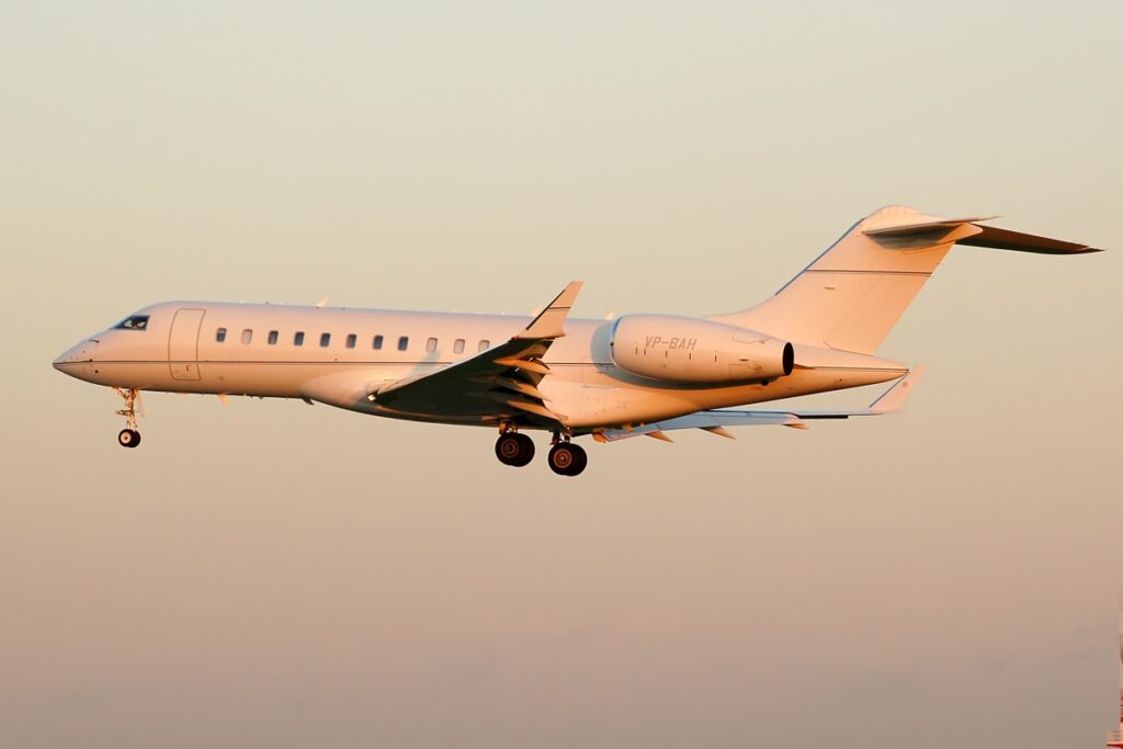 Bombardier Global Express exterior at sunset on approach to airport