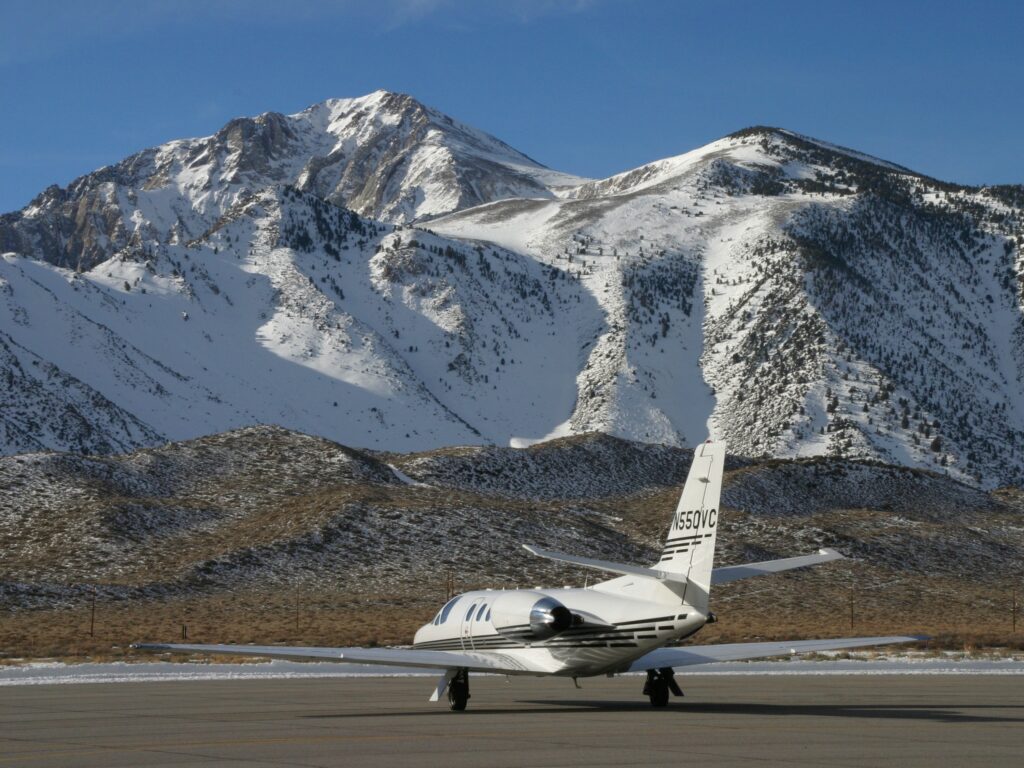 Citation Jet in the Mountains parked at airport, reg number N550VC
