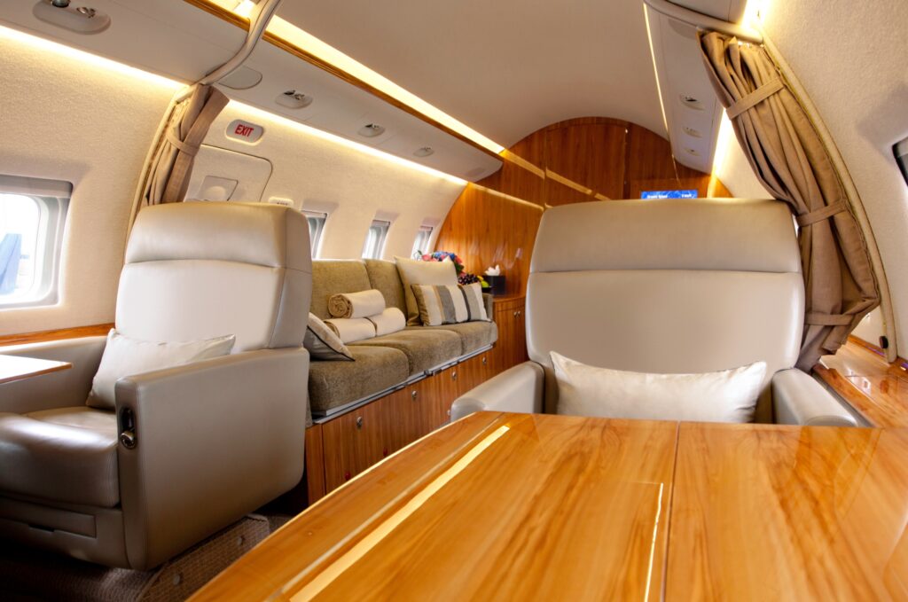 Private jet interior large with divan in rear of frame