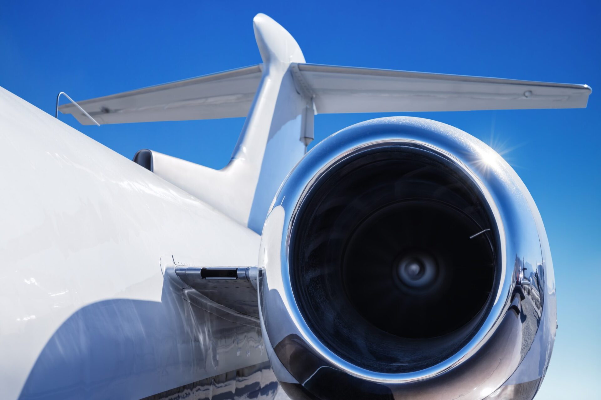 close up looking back of private jet engine