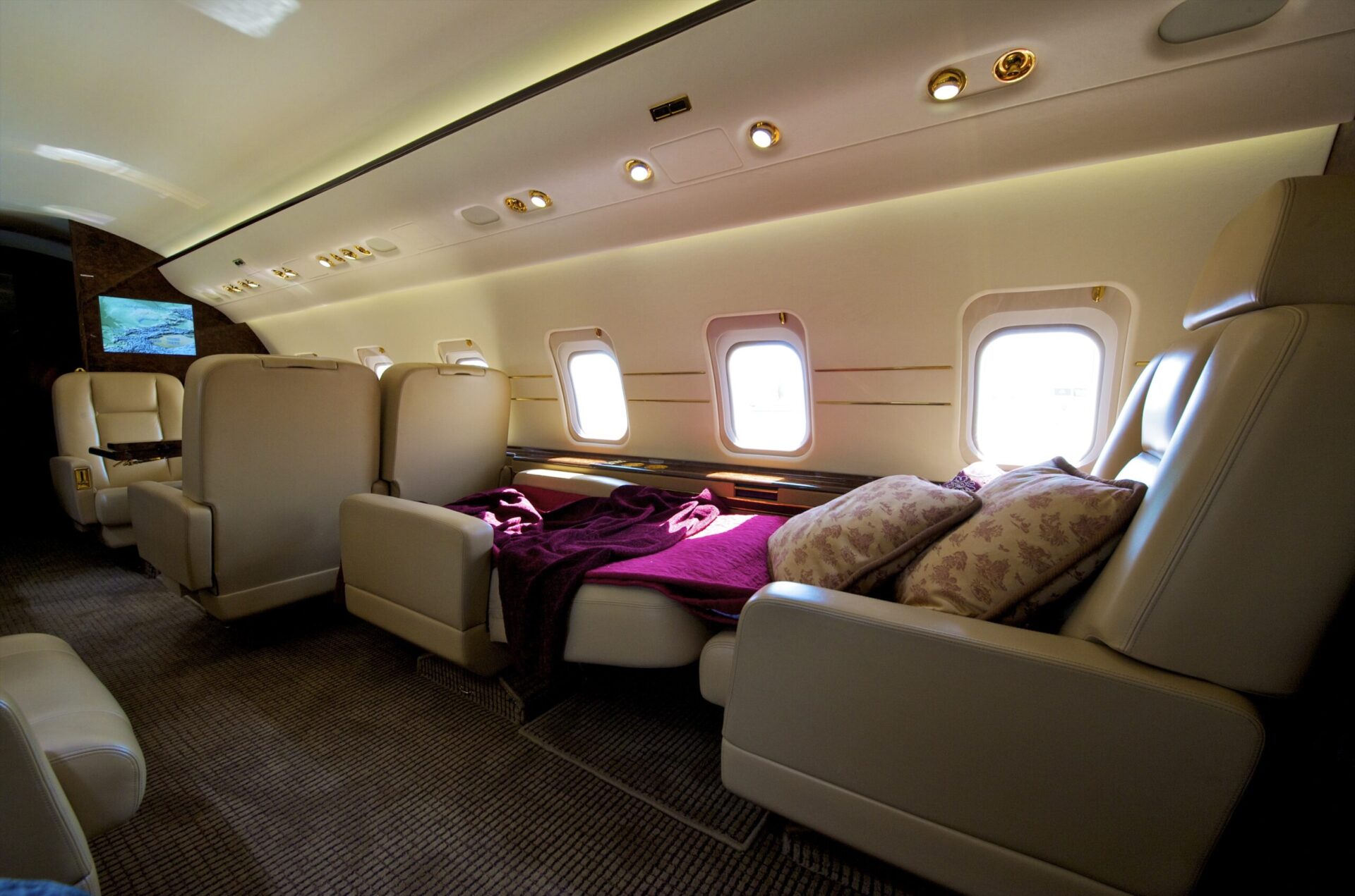 Interior seats converted to bed large jet