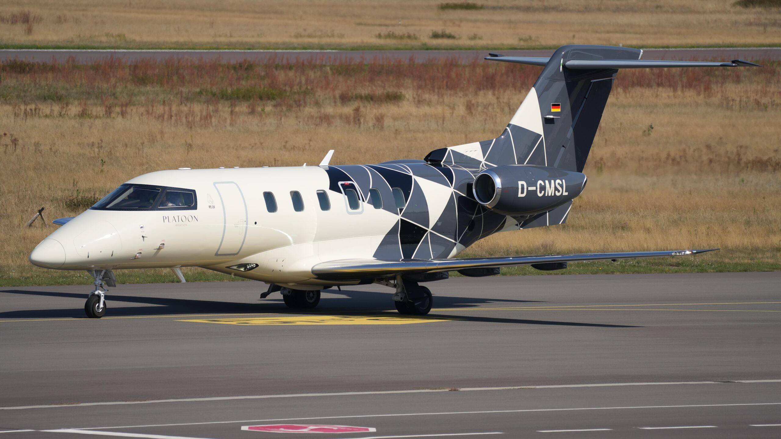 Pilatus PC-24 exterior on ground taxiing reg number D-CMSL