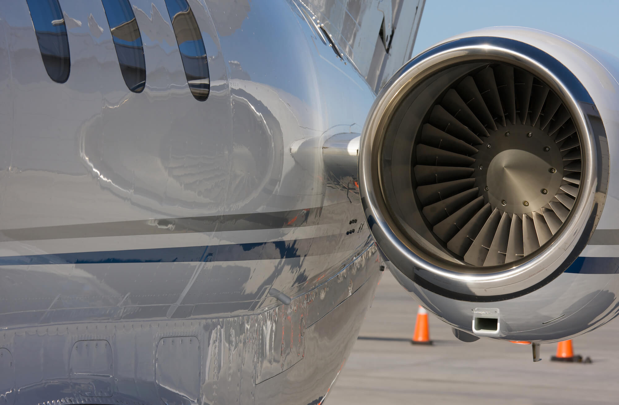 Private jet engine looking back