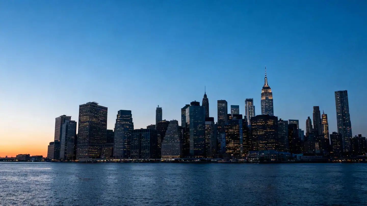 The Manhattan skyline across the Hudson River at dusk